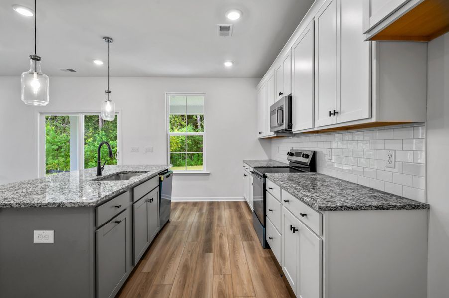 Furnished interior view inside a new home in Creekside at Andrews, Summerville (Image 10). Furnished interior view inside a new home in Creekside at Andrews, Summerville (Image 10).