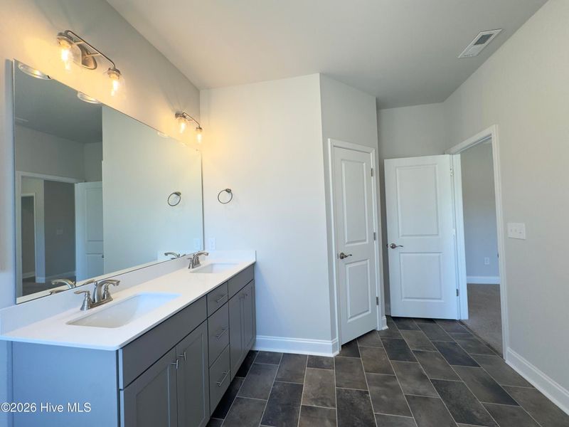 Furnished interior view inside a new home in East Lake, Leland (Image 8).