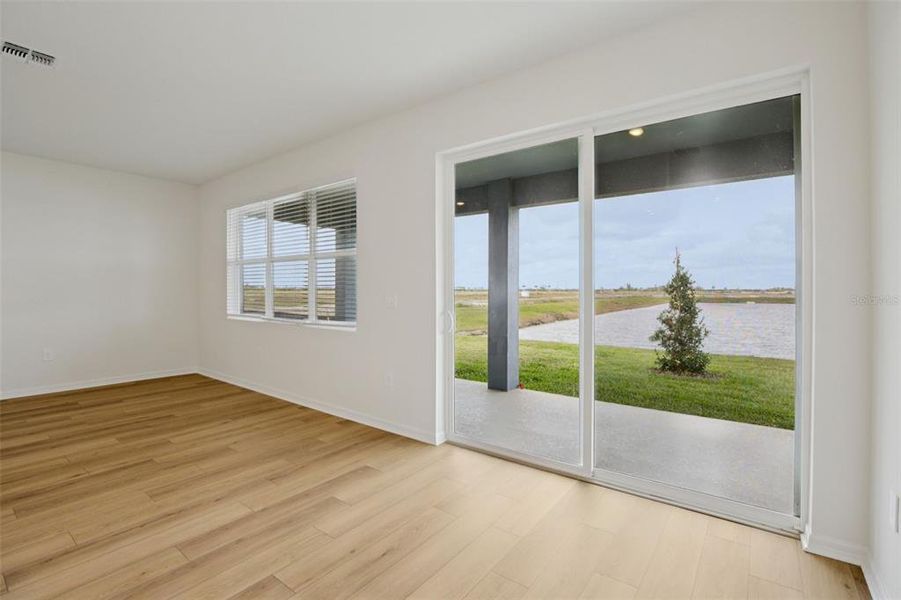 Spacious, unfurnished interior of a new home in Coasterra - Reserve Series, Palmetto (Image 24).