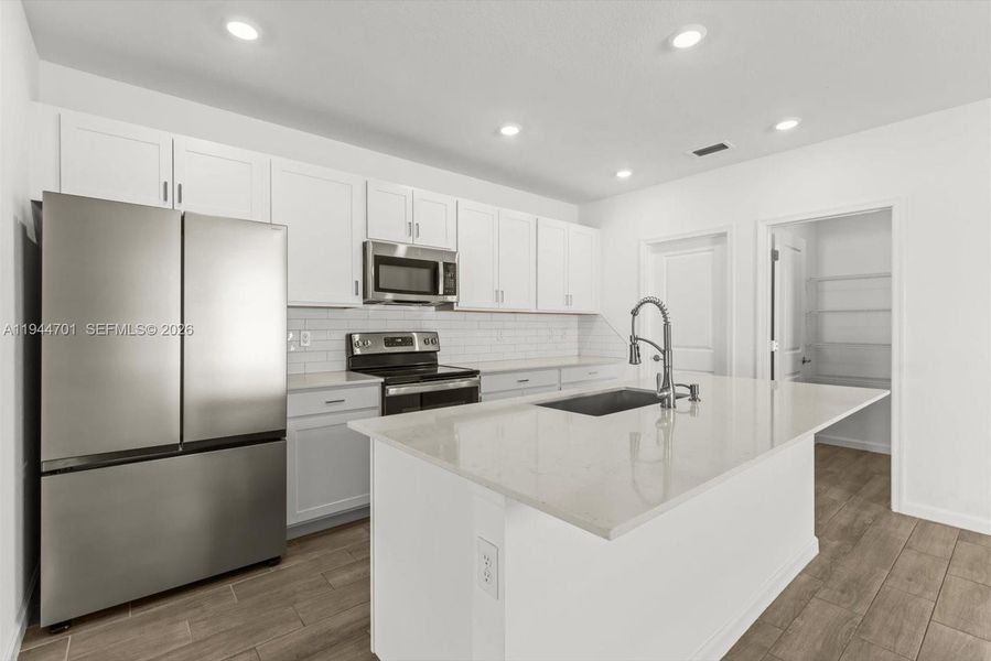 Furnished interior view inside a new home in , Fort Pierce (Image 14).