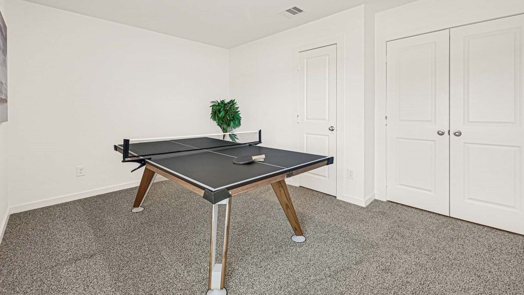 Furnished interior view inside a new home in Tamarron, Fulshear (Image 32).