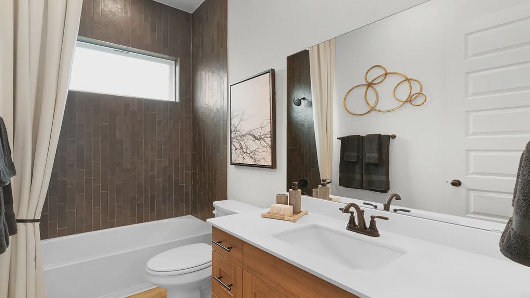 Representative furnished interior of a home built from the Madison by Chesmar Homes in Nolina, Georgetown (Image 6).