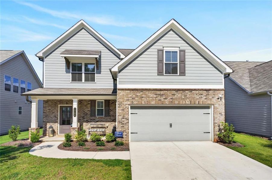 Front exterior of a new home in Avenbrook, Mableton, GA, highlighting curb appeal (Image 2). Front exterior of a new home in Avenbrook, Mableton, GA, highlighting curb appeal (Image 2).