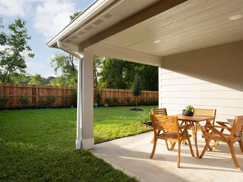 Exterior details and patio area of a home in Pine Lake Cove - Premier Series, Montgomery (Image 2).