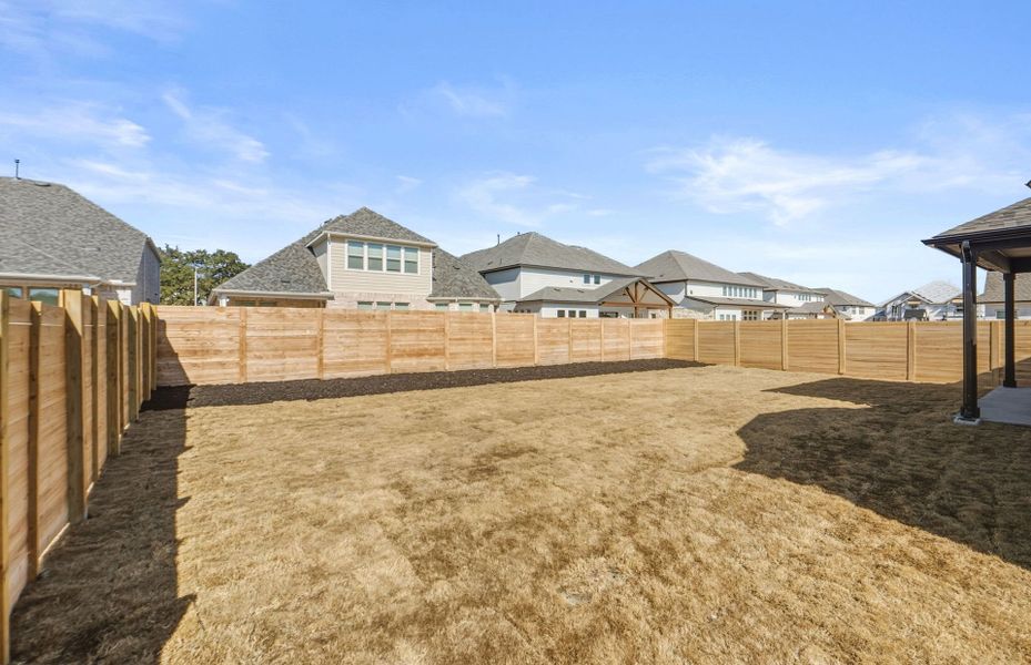 Exterior details and patio area of a home in Bluffview Reserve, Leander (Image 3).