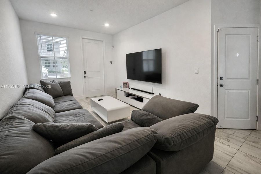 Bright and spacious living area filled with natural light Bright and spacious living area filled with natural light