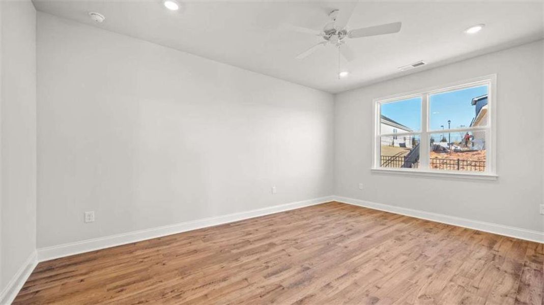 Spacious, unfurnished interior of a new home in Oak Ridge Meadows - Active Adult, Locust Grove (Image 21).