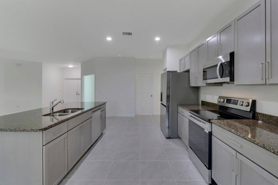 Furnished interior view inside a new home in , Port St. Lucie (Image 5).