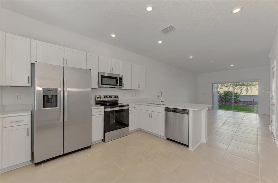 Furnished interior view inside a new home in , Sarasota (Image 8).