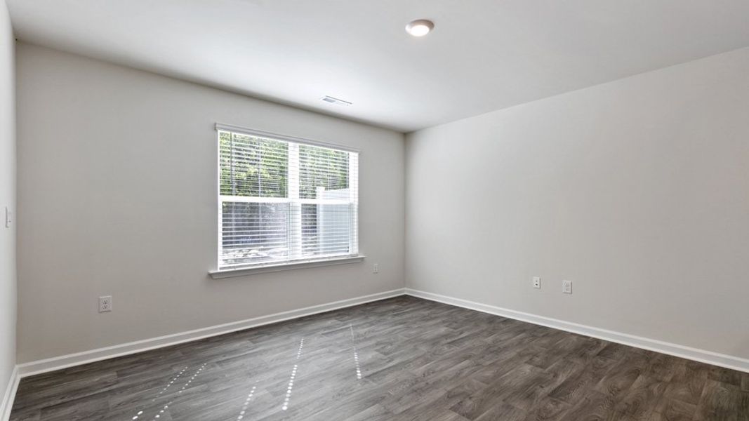 Spacious, unfurnished interior of a new home in North Village Townes, Greensboro (Image 12).