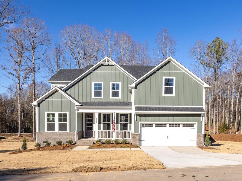 Front exterior of a new home in Laneridge Estates, Raleigh, NC, highlighting curb appeal (Image 2).