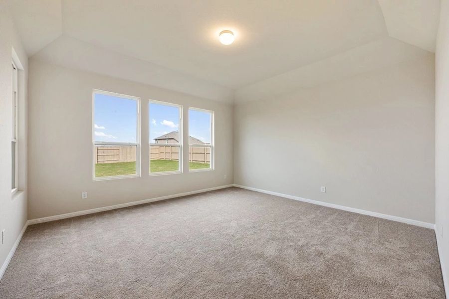 Spacious, unfurnished interior of a new home in The Colony 50s, Bastrop (Image 40).
