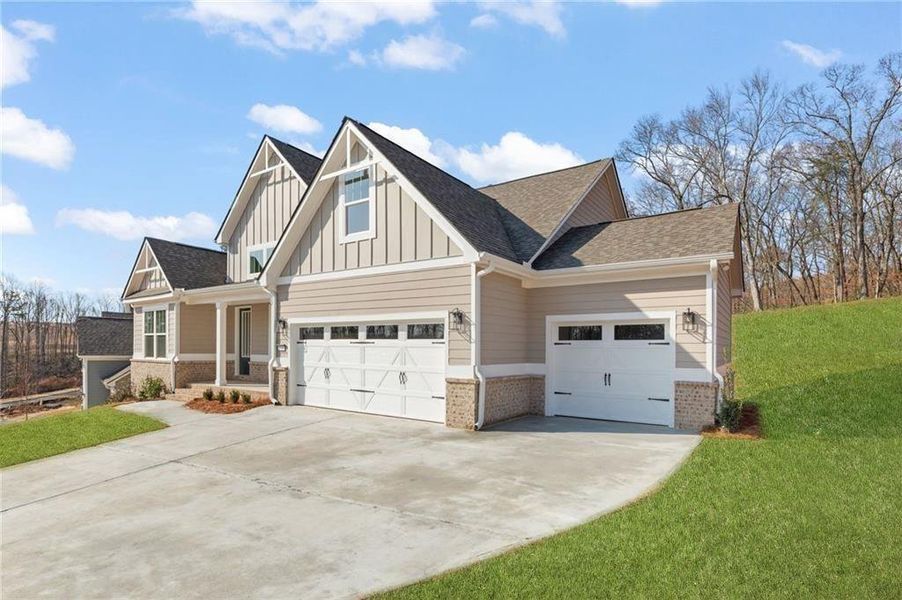 Front exterior of a new home in , Gainesville, GA, highlighting curb appeal (Image 2).