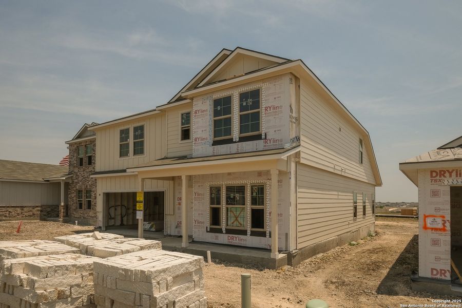 Front exterior of a new home in Paloma Park, Converse, TX, highlighting curb appeal (Image 14). Front exterior of a new home in Paloma Park, Converse, TX, highlighting curb appeal (Image 14).
