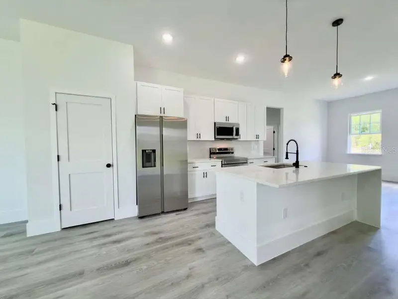 Furnished interior view inside a new home in , Ocala (Image 7).