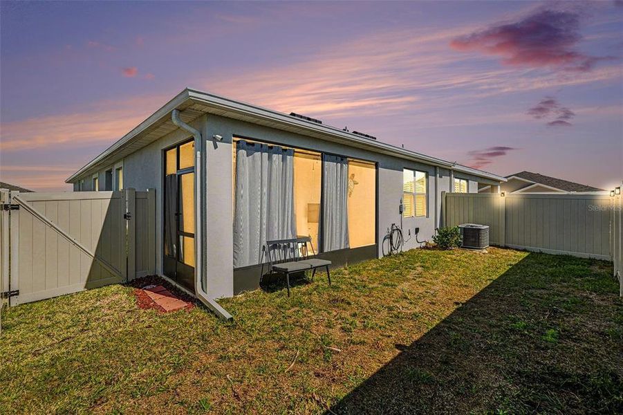 Exterior details and patio area of a home in Woodcreek, Wesley Chapel (Image 25).