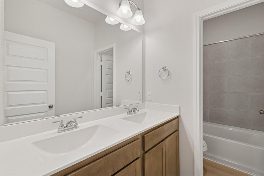 The Mockingbird II- Hall Bath with Dual Vanities The Mockingbird II- Hall Bath with Dual Vanities