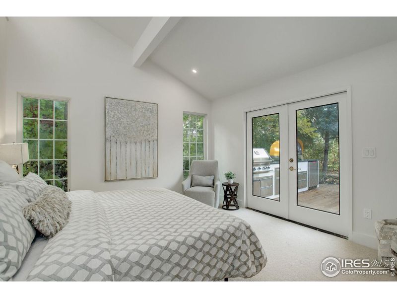 Secondary bedroom suite with access to the private outdoor patio