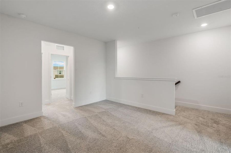 Spacious, unfurnished interior of a new home in Magnolia Reserve, Ocoee (Image 20).