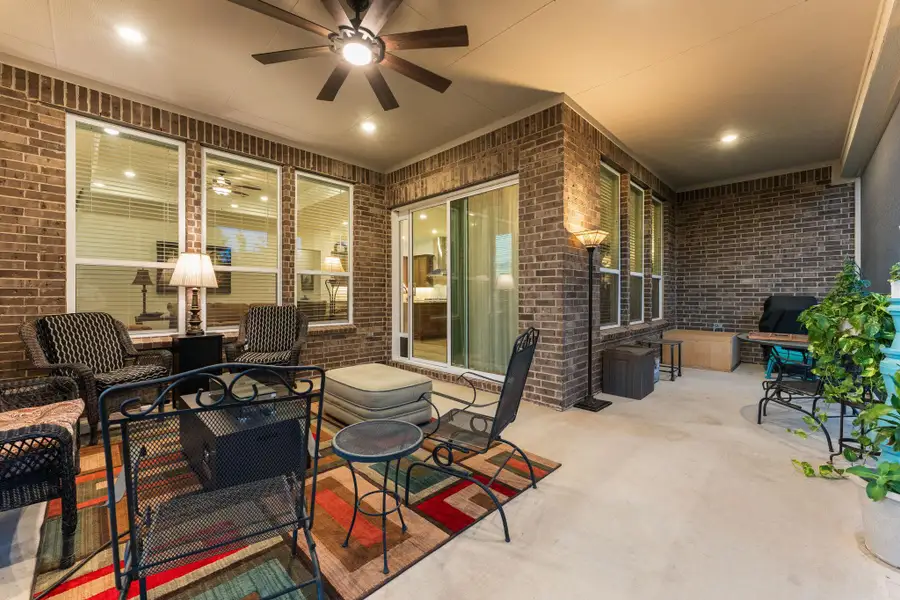 Not only is there an extended covered back patio, but is also completely enclosed and features a gas line for your grill! Not only is there an extended covered back patio, but is also completely enclosed and features a gas line for your grill!