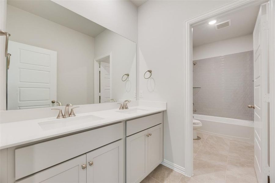 Furnished interior view inside a new home in Valencia On The Lake, Little Elm (Image 6). Furnished interior view inside a new home in Valencia On The Lake, Little Elm (Image 6).