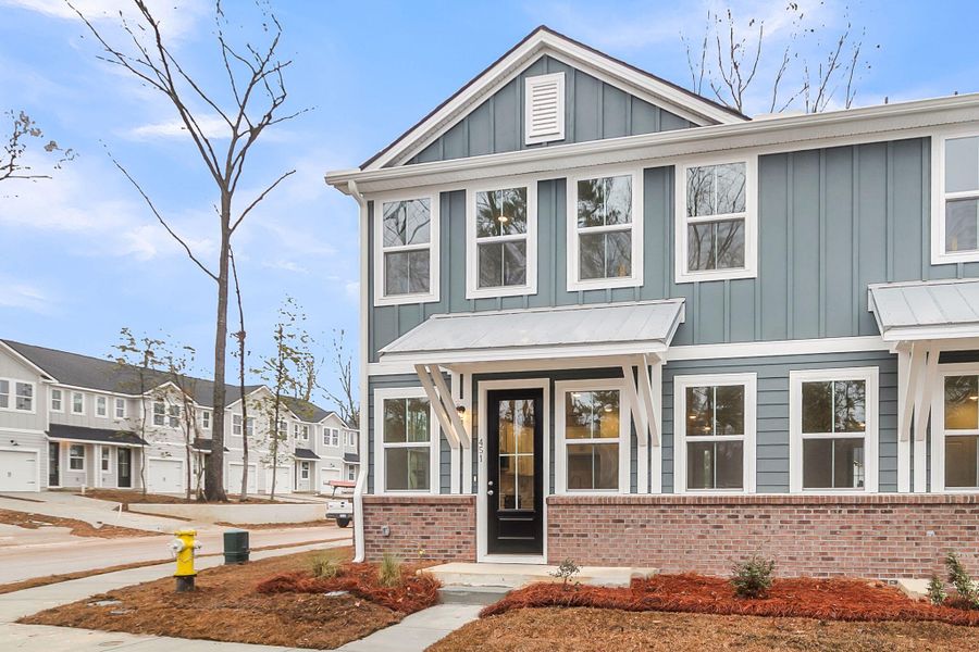 Front exterior of a new home in Windward Village, Summerville, SC, highlighting curb appeal (Image 30). Front exterior of a new home in Windward Village, Summerville, SC, highlighting curb appeal (Image 30).