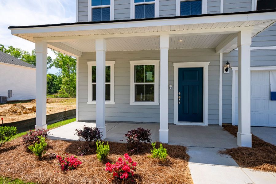 Exterior details and patio area of a home in Monroe Preserve, Chapin (Image 4).