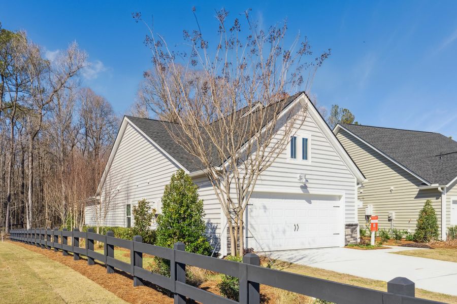 Front exterior of a new home in Horizons at Summers Corner | 55+, Summerville, SC, highlighting curb appeal (Image 2).