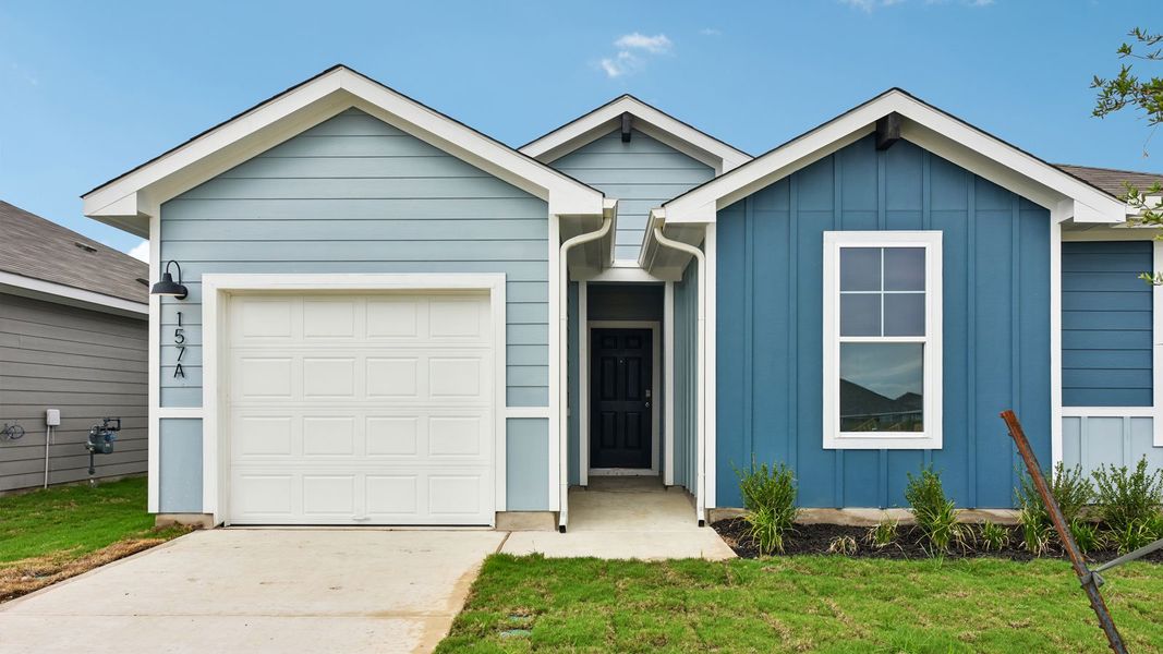 Front exterior of a new home in Wayside, Uhland, TX, highlighting curb appeal (Image 2).