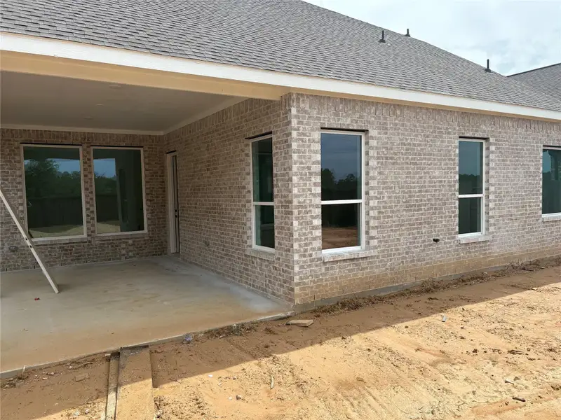 Exterior details and patio area of a home in The Trails, New Caney (Image 4).