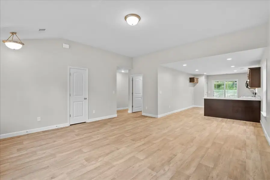 Representative unfurnished interior of a home built from the Lyman by Enchanted Homes in Lonesome Dove, San Antonio (Image 17).