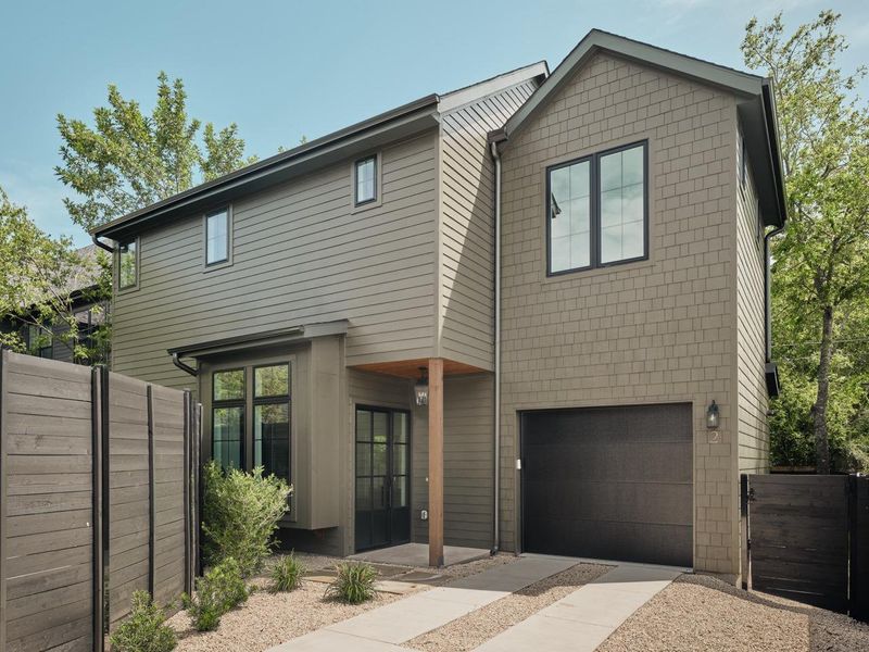 View of front of house featuring an attached garage View of front of house featuring an attached garage