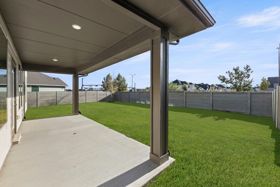 Exterior details and patio area of a home in Painted Tree, McKinney (Image 3).