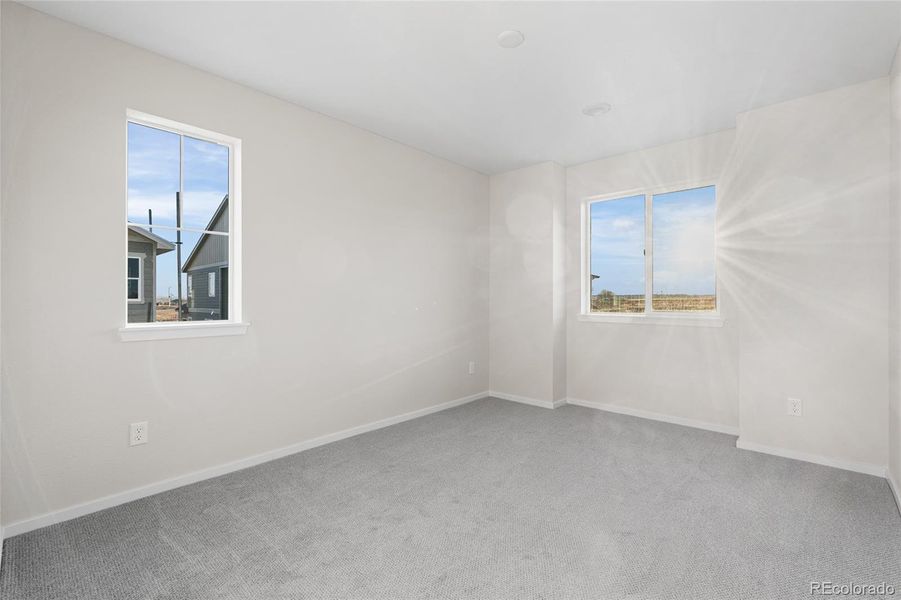 Spacious, unfurnished interior of a new home in Barefoot Village, Firestone (Image 17).