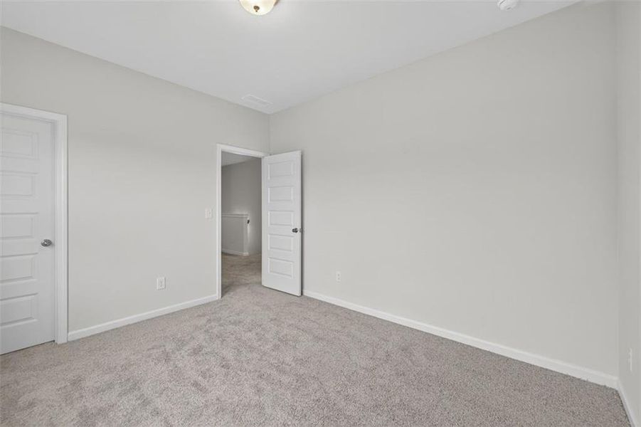 Spacious, unfurnished interior of a new home in Roxeywood Park, Winder (Image 32).