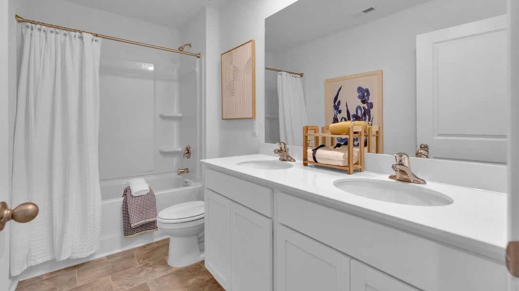 Representative furnished interior of a home built from the Penwell by D.R. Horton in Fairview Hills, Cleveland (Image 13).