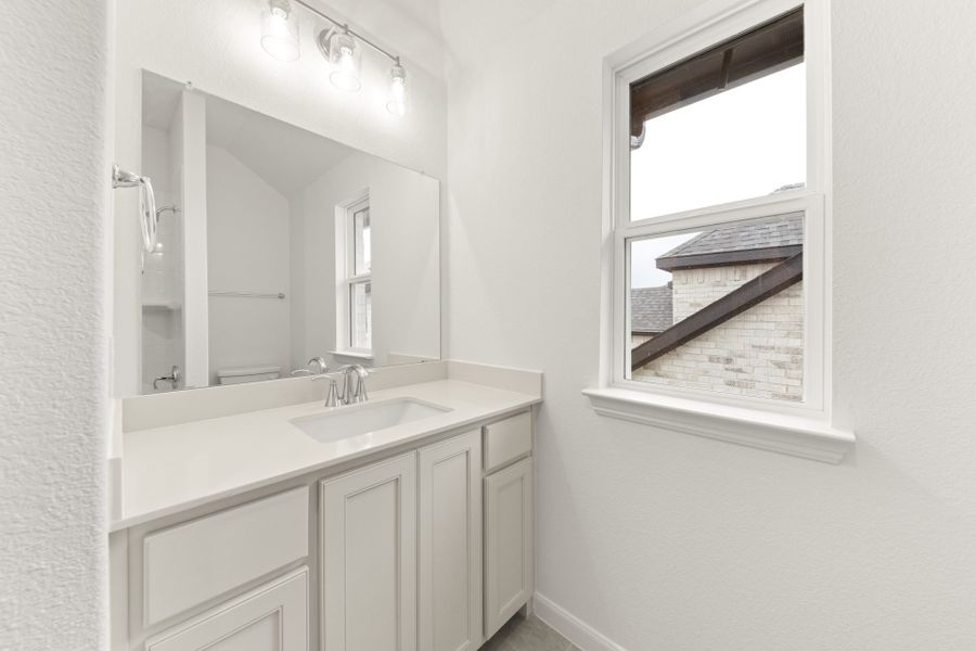 Furnished interior view inside a new home in Creekview Meadows, Pilot Point (Image 11).