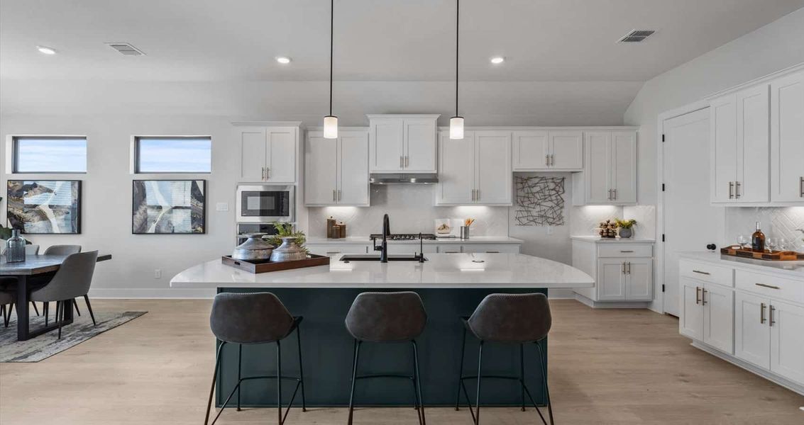 Representative furnished interior of a home built from the Bryant by Chesmar Homes in Sunfield, Buda (Image 6).