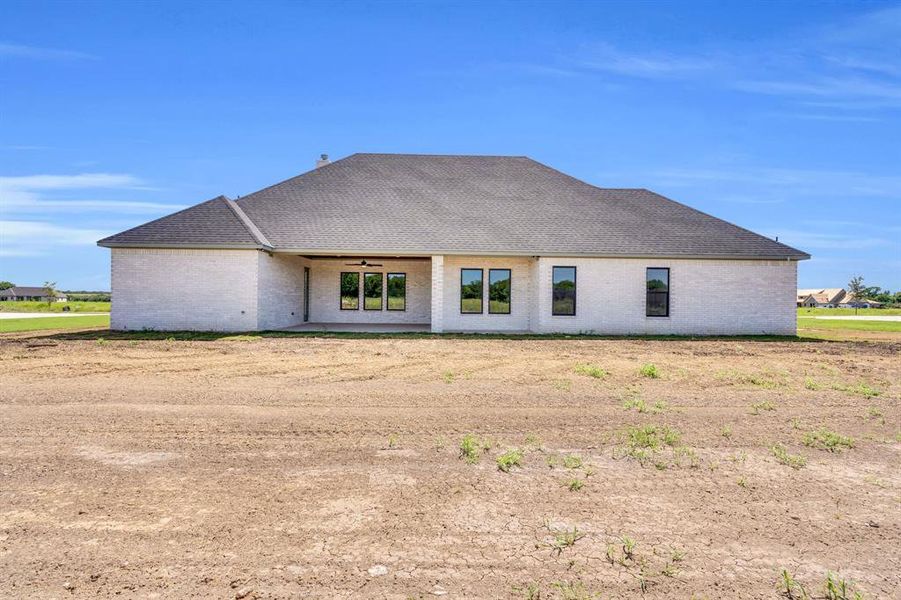Front exterior of a new home in , Waxahachie, TX, highlighting curb appeal (Image 16).