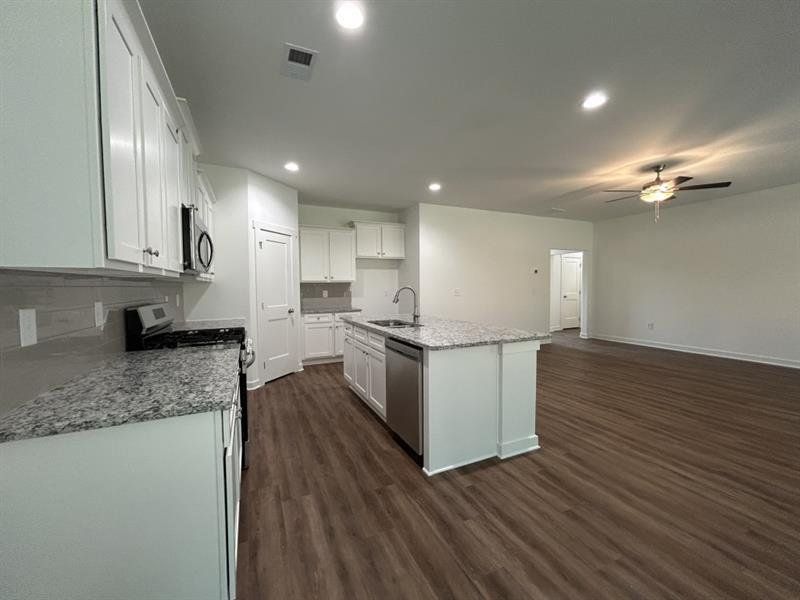 Furnished interior view inside a new home in Sutton's Landing, Statham (Image 5).