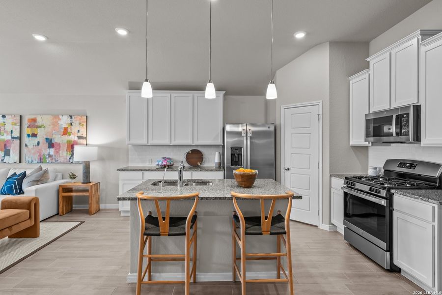Furnished interior view inside a new home in Hunters Ranch, San Antonio (Image 34).