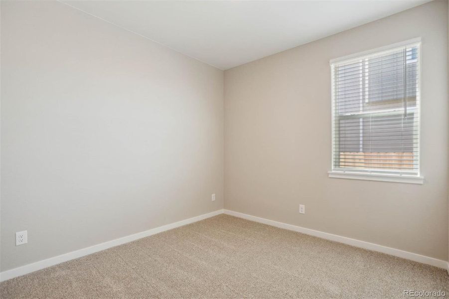 Spacious, unfurnished interior of a new home in Second Creek Farm, Commerce City (Image 10).