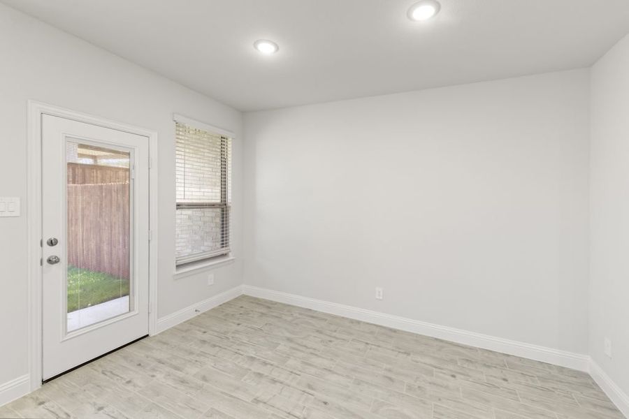 Front exterior of a new home in Sereno Oaks at Buckner Terrace, Dallas, TX, highlighting curb appeal (Image 14). Front exterior of a new home in Sereno Oaks at Buckner Terrace, Dallas, TX, highlighting curb appeal (Image 14).
