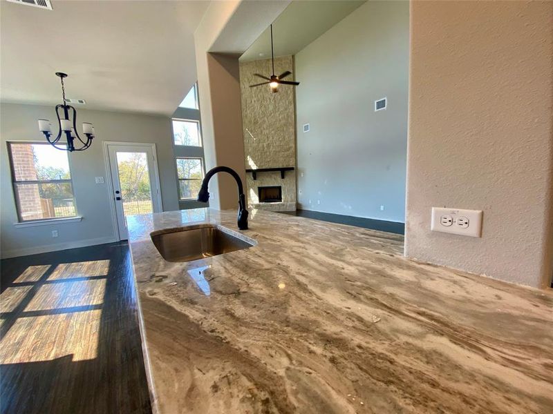 Close up view of swirling custom Fantasy Brown granite