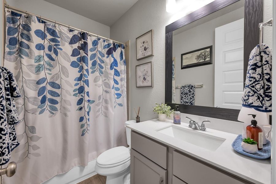 Furnished interior view inside a new home in Grand Central Park 45', Conroe (Image 28).