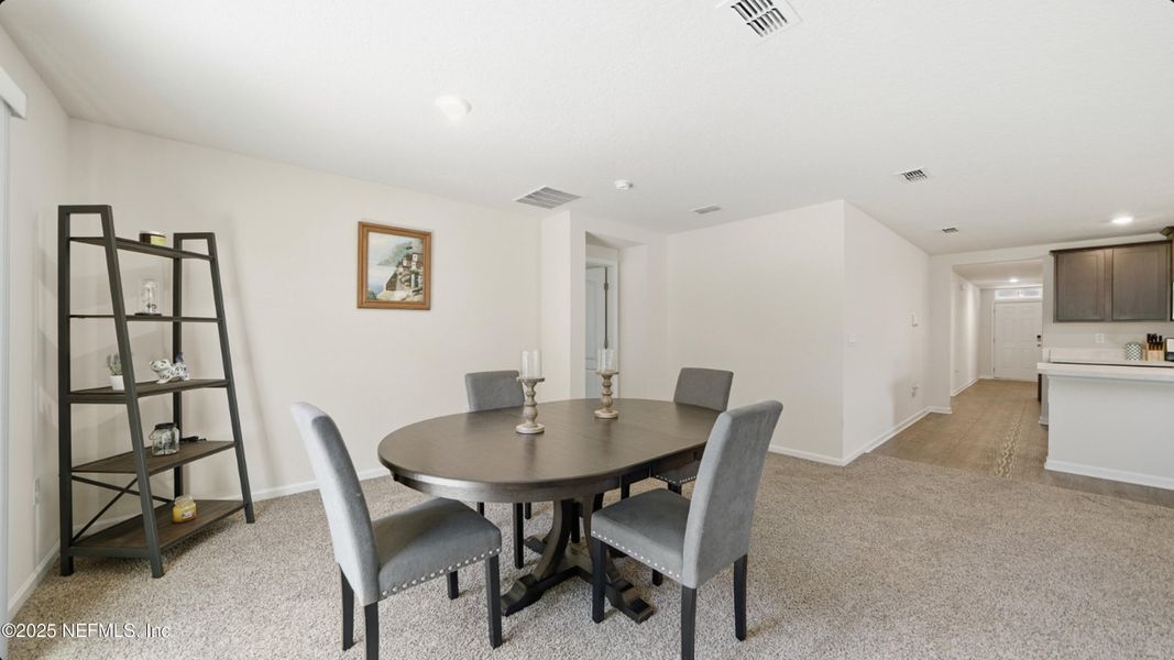 Furnished interior view inside a new home in River Glen Express, Yulee (Image 16).