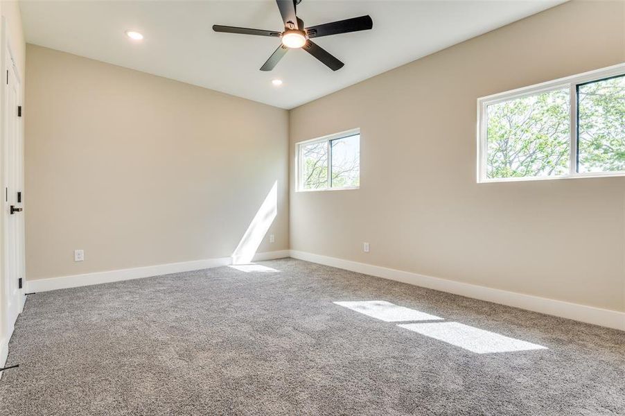 Owners Suite with large custom walk in closet Owners Suite with large custom walk in closet