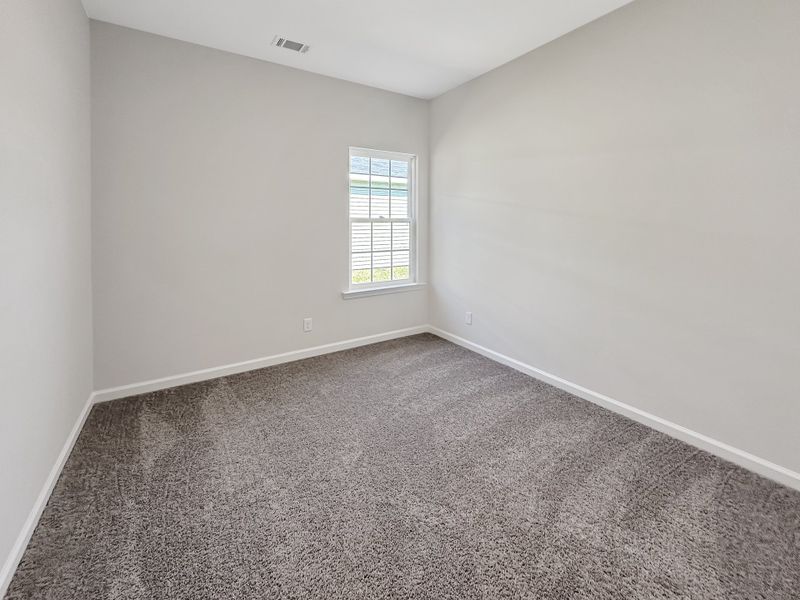 Spacious, unfurnished interior of a new home in Grand Reserve, Ludowici (Image 20).