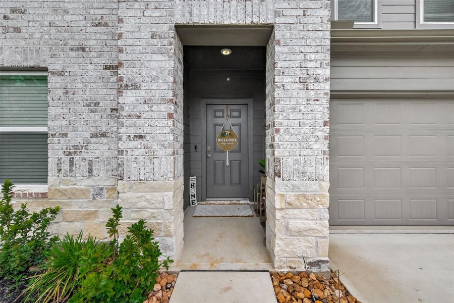 Exterior details and patio area of a home in Grand Pines, Magnolia (Image 25).