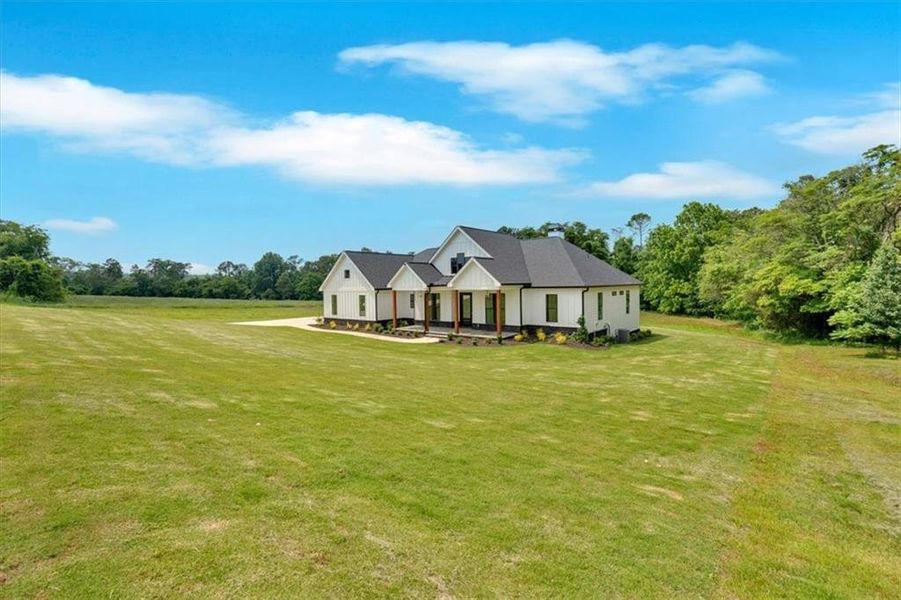 Front exterior of a new home in , Rydal, GA, highlighting curb appeal (Image 2). Front exterior of a new home in , Rydal, GA, highlighting curb appeal (Image 2).